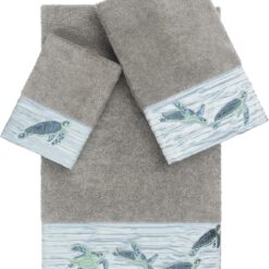 3-Piece Towel Set: Turtle-pattern design crafted from premium Turkish cotton—highly absorbent and durable; includes 1 bath towel, 1 hand towel, and 1 washcloth.