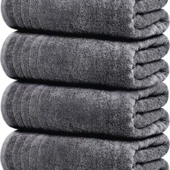4-Pack Oversized Bath Towels (30 x 60 inches) — 100% Pure Cotton. Larger in size yet lighter in weight, featuring quick-drying properties; super soft and highly absorbent—an essential addition to any bathroom.